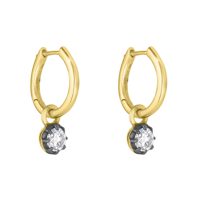 Gold hoop earrings with small round gemstones on a white background