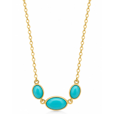 A gold chain necklace featuring three oval turquoise cabochon stones in gold settings, with one larger central stone and two smaller side stones, shown on a plain white background.