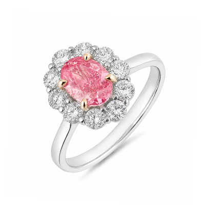 Ring with a pink gemstone and diamond accents on a white background