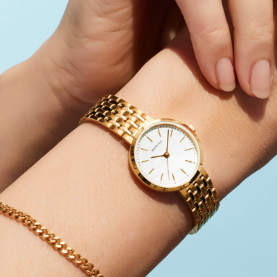 Ladies' Bering Titanium Mother-of-Pearl Polished Gold Watch