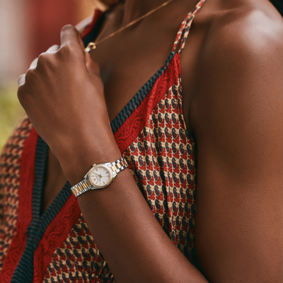 Model wearing Bulova two tone watch
