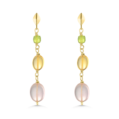 Gold earrings with green and pink beads on a white background