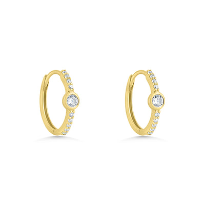 Gold hoop earrings with small diamonds on a white background