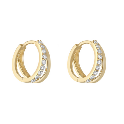 Gold hoop earrings with embedded diamonds on a white background