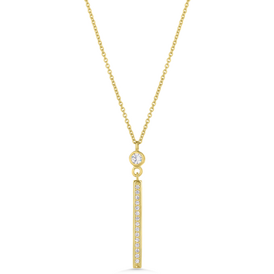 Gold necklace with a diamond pendant on a white background