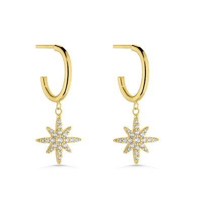 Gold hoop earrings with star-shaped charms on a white background