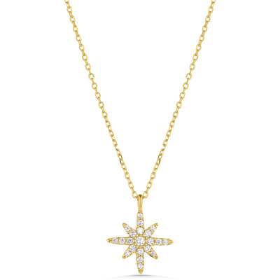 Gold necklace with a star-shaped pendant on a white background