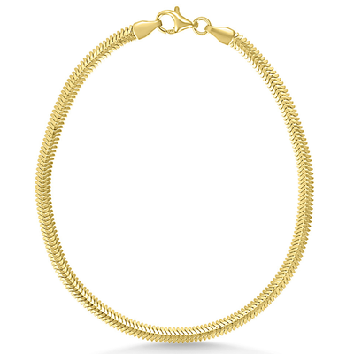 Gold bracelet on a white background