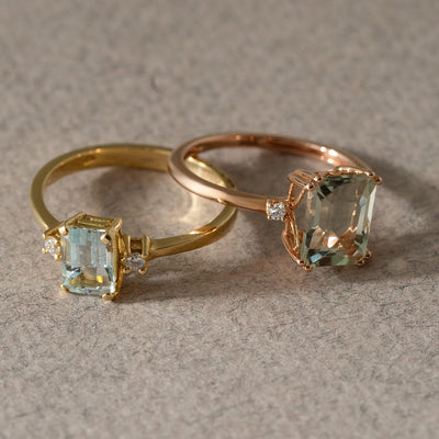 Still life aquamarine and green amethyst rings