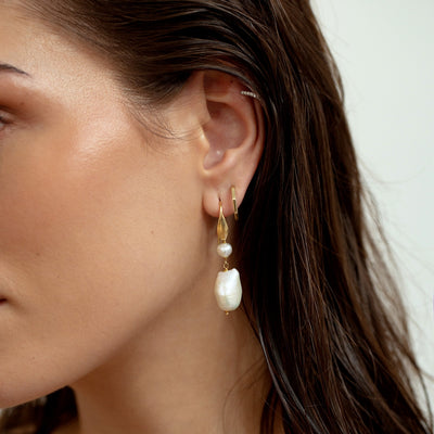 model wearing baroque pearl drops