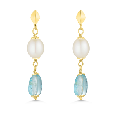 Gold earrings with white and blue beads on a white background