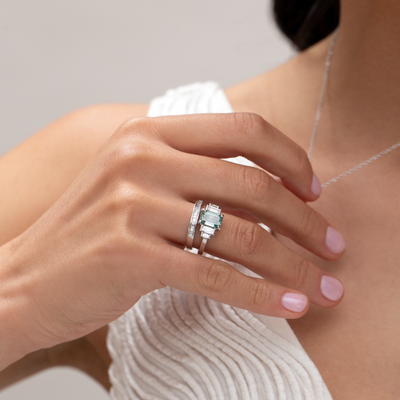 Emerald Cut Teal Green Diamond Ring modelled