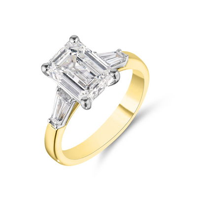 Emerald & Tapered Baguette Cut Diamond Ring