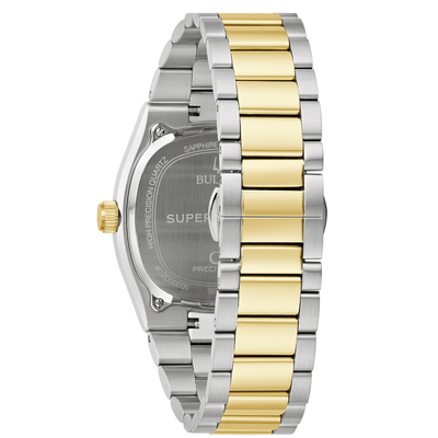 A two-tone stainless steel and yellow gold watch with a link bracelet, shown from the back on a white background.