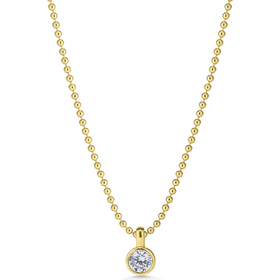 Gold beaded necklace with a round diamond pendant on a white background