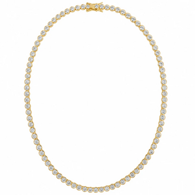 A yellow gold tennis necklace adorned with round-cut clear gemstones, arranged in a horizontal oval on a solid white background.