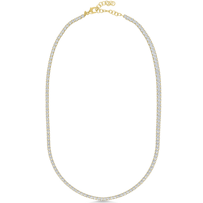 Gold necklace with clear stones on a white background