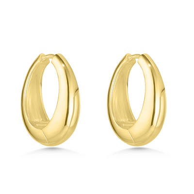 Gold hoop earrings on a white background