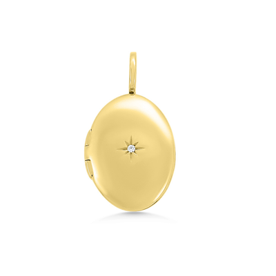 Gold locket with a diamond on a white background
