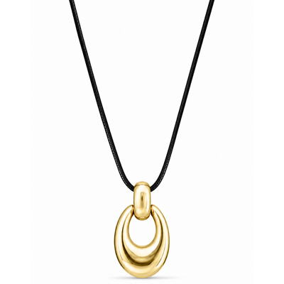 Gold necklace with a black cord on a white background