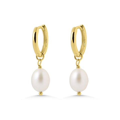 Gold hoop earrings with pearl drops on a white background