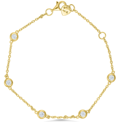 Gold bracelet with diamond accents on a white background