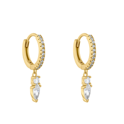 Gold hoop earrings with clear gemstones on a white background