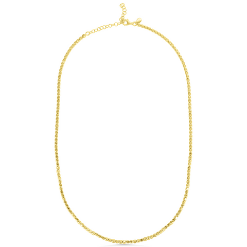 Gold necklace on a white background