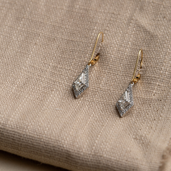 Kite diamond drops on textured backdrop