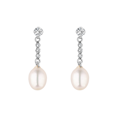 Pair of pearl earrings with silver clasps on a white background