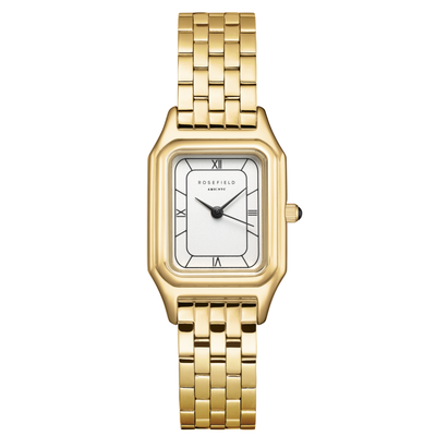 Gold wristwatch with a white face on a white background