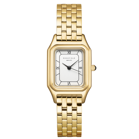 Gold wristwatch with a white face on a white background