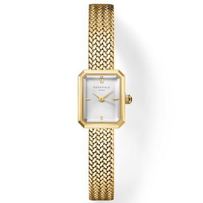 Gold watch with a textured strap on a white background