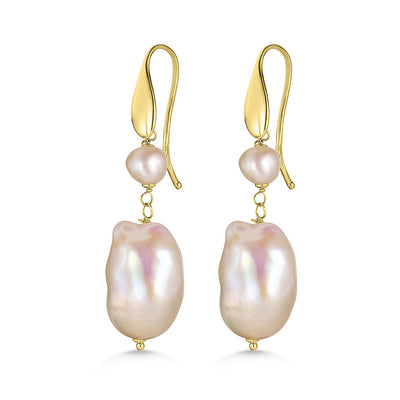 A pair of gold baroque pearl drop earrings with hooks, featuring large irregular white pearls connected to gold hoops.