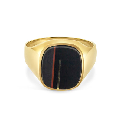 A yellow gold signet ring with an ornate black onyx gemstone.